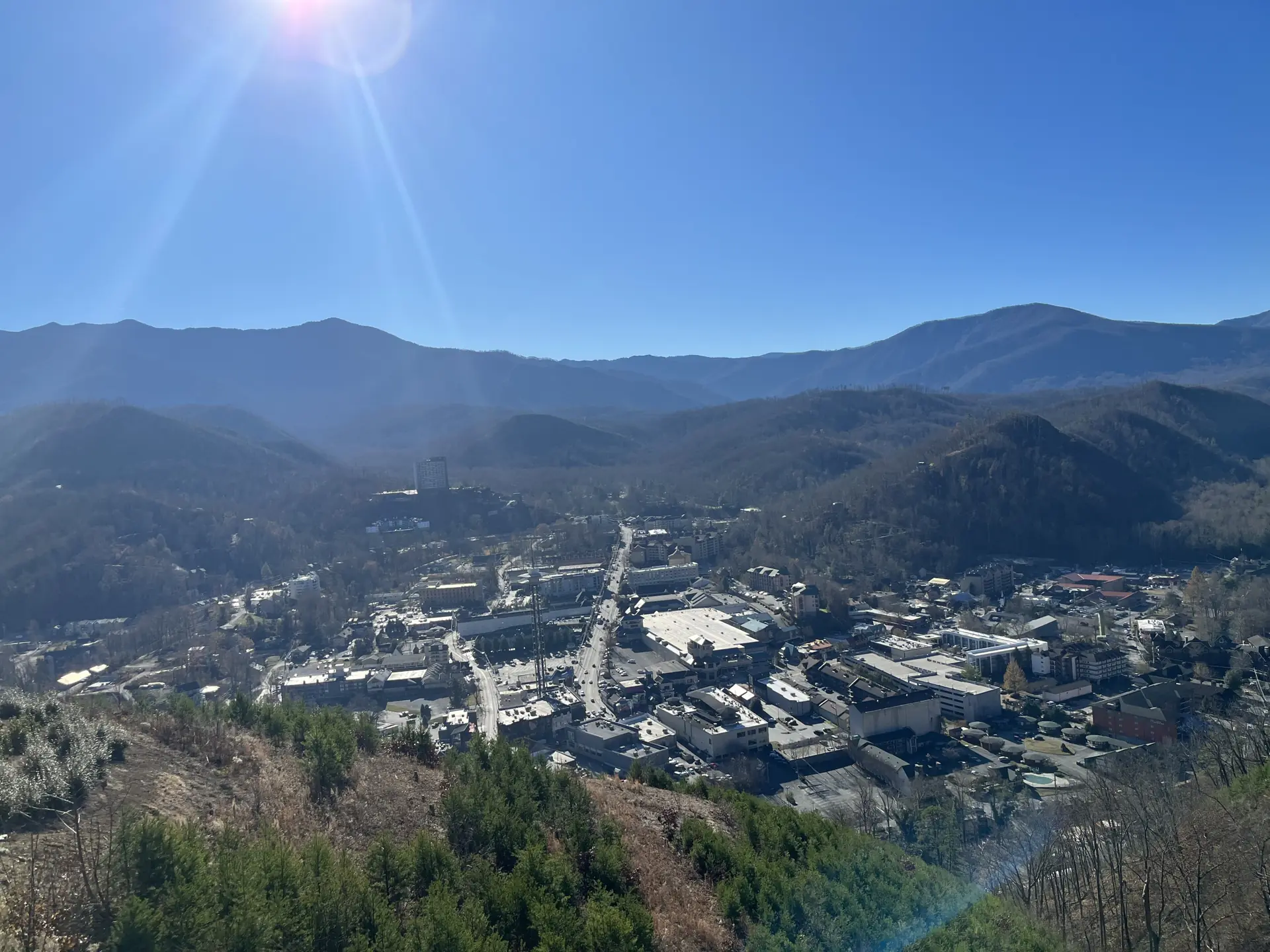 Downtown Gatlinburg in its valley seen from the mountainside above