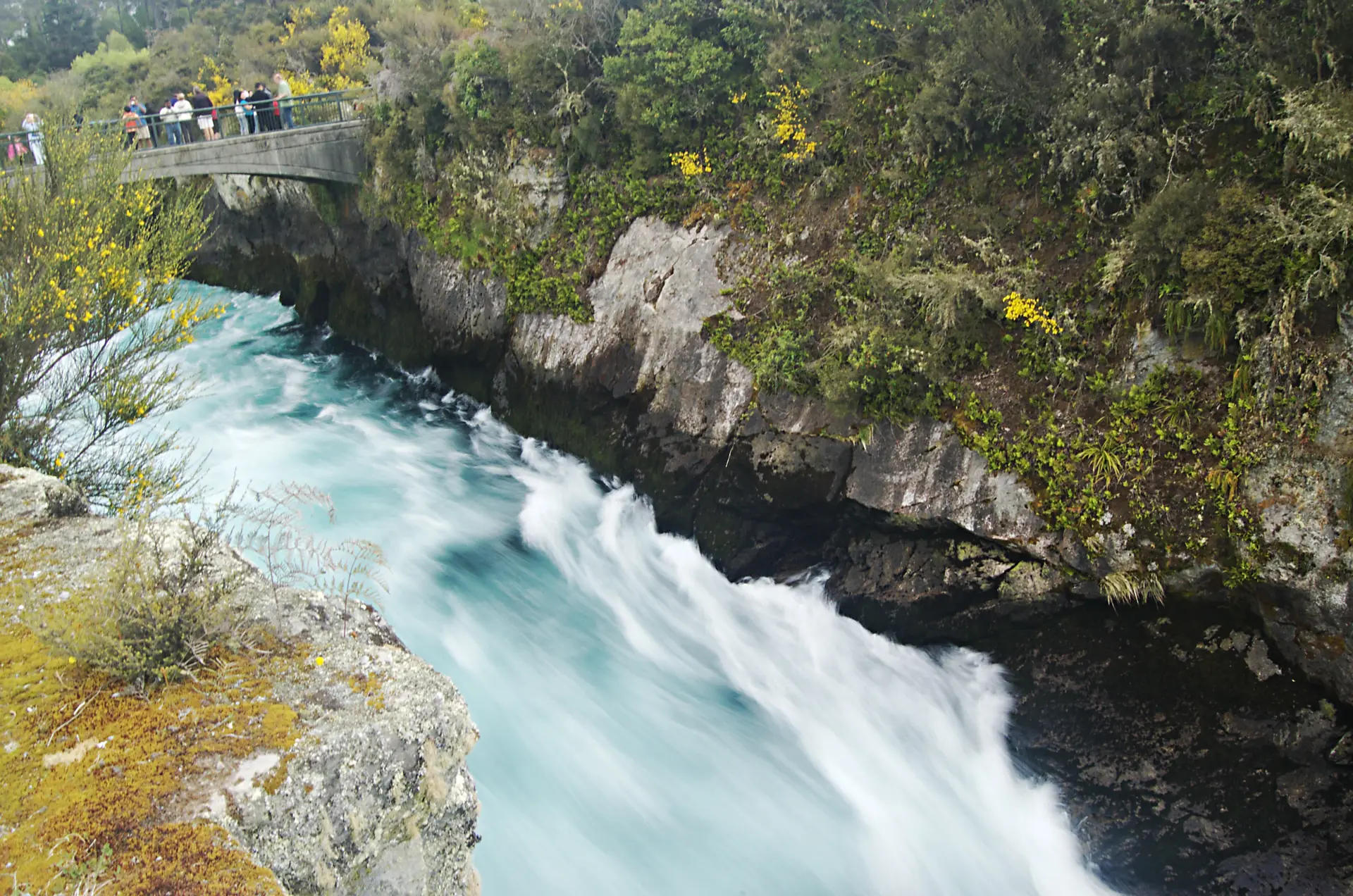 The blue water of the Waikato river in its canyon at Taupō