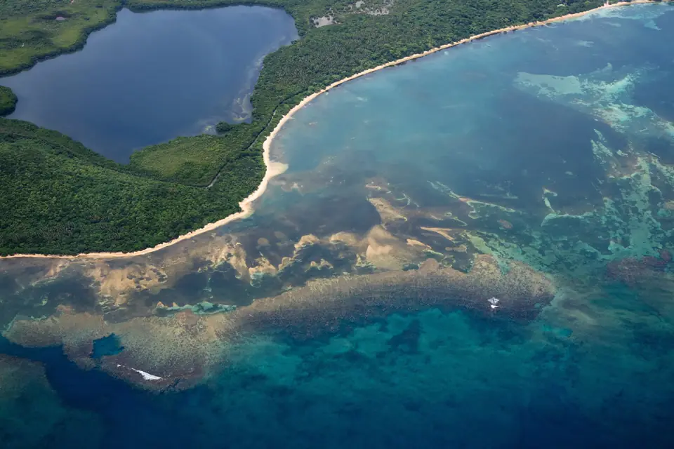 Turquoise reef and shoreline of an island off eastern Puerto Rico photographed from an aircraft