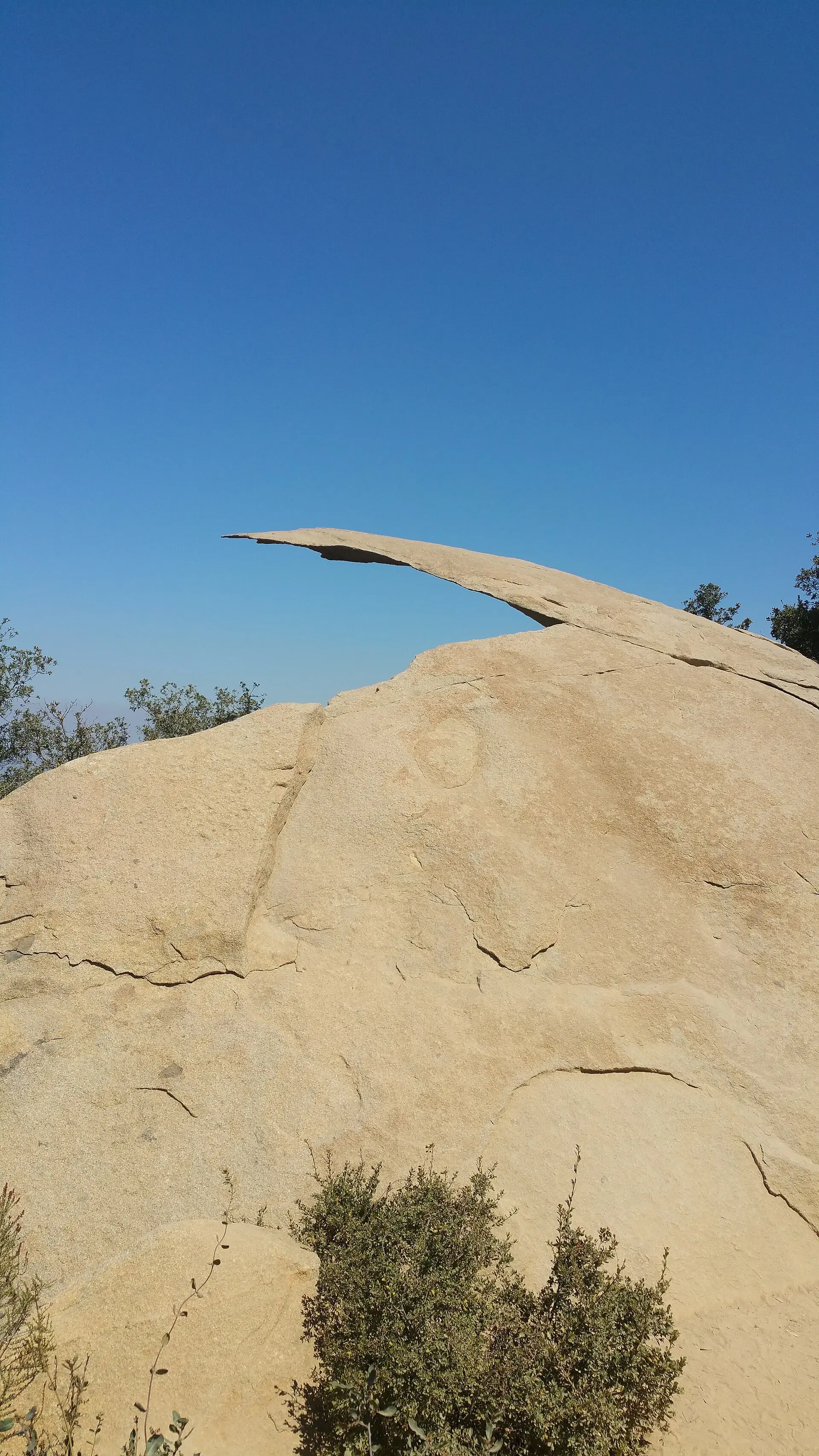Potato Chip Rock, a thin granite slab jutting out over the slope