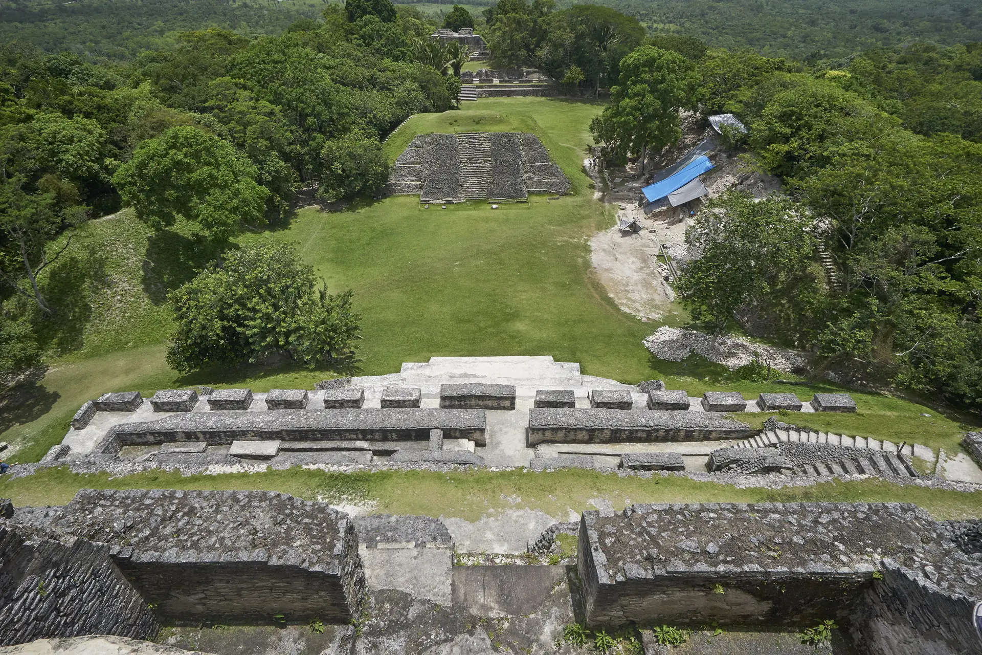 The view down from El Castillo over the plaza of Xunantunich and the surrounding jungle